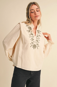 Embroidered Smocked Mock Neck Top