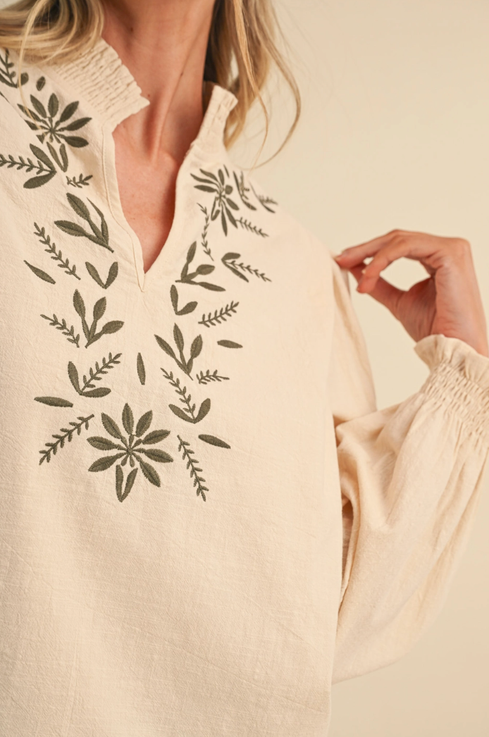 Embroidered Smocked Mock Neck Top